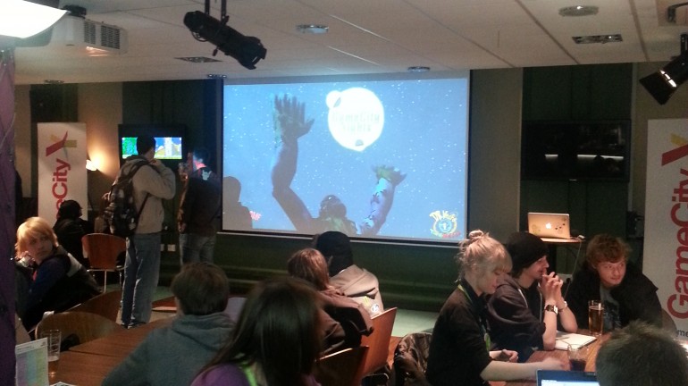 Dr. Necro's Time of Death was demonstrated at Game City Nights. People from the team are in the foreground of this photo.